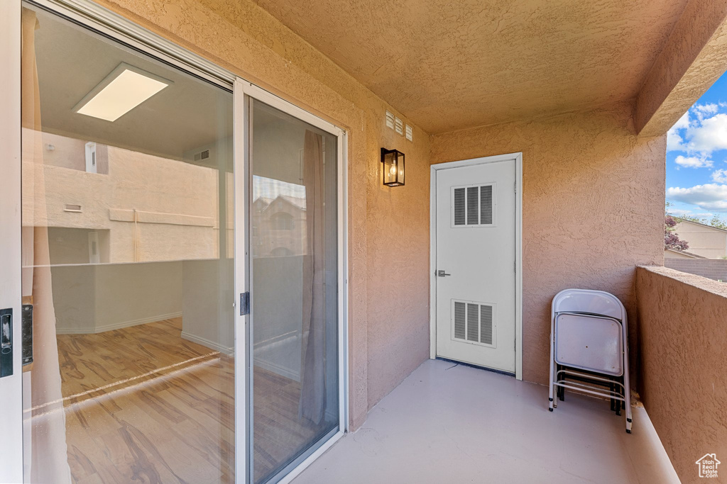 Balcony featuring visible vents