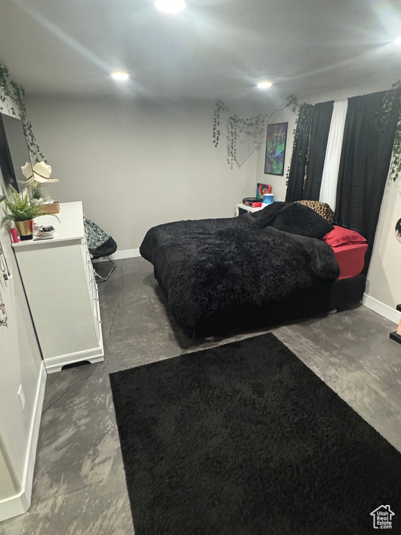 Bedroom featuring baseboards