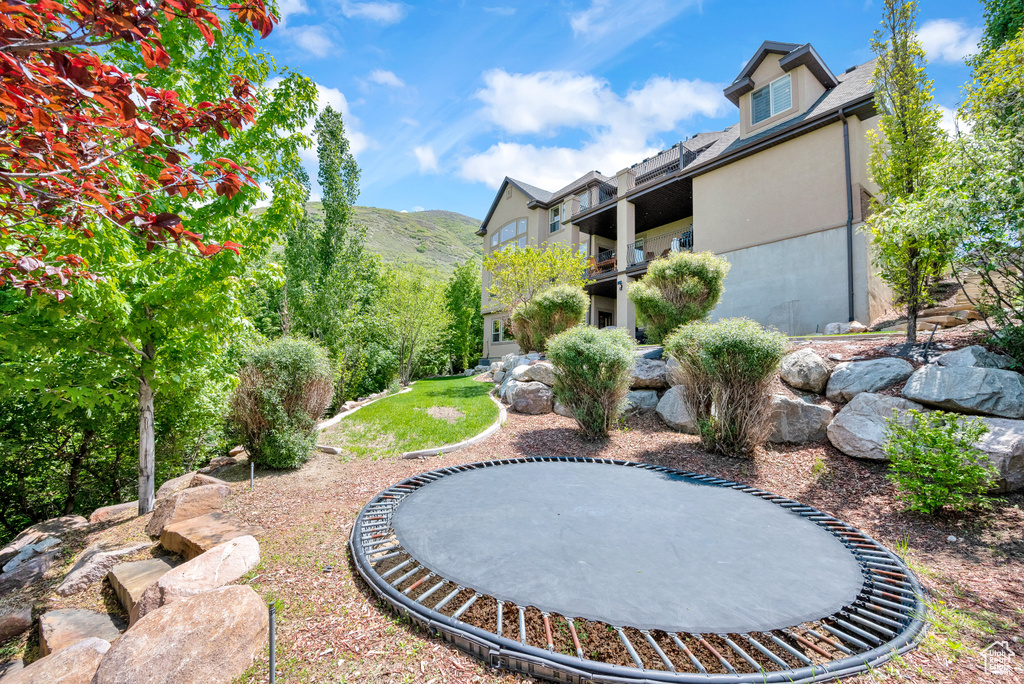 View of yard with a mountain view