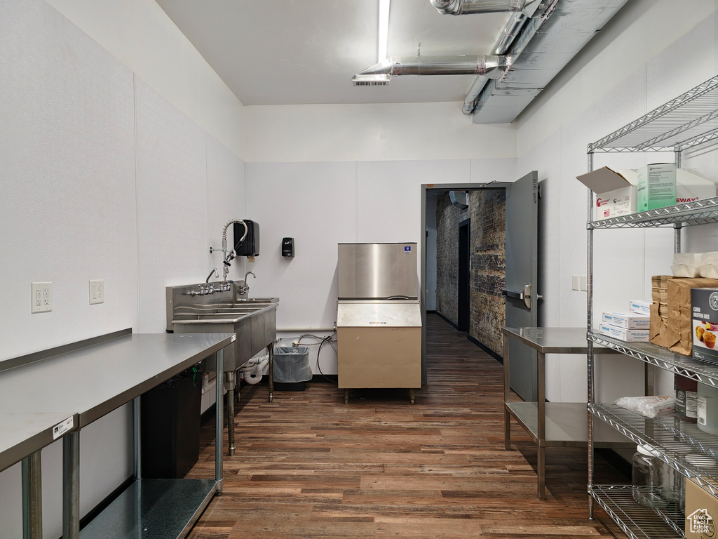 Kitchen featuring dark wood finished floors