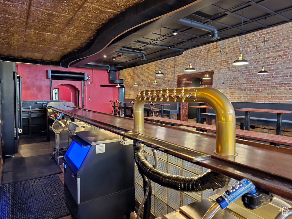 Bar featuring brick wall