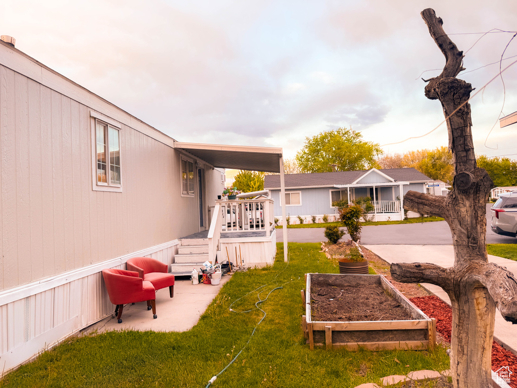 View of yard with a vegetable garden