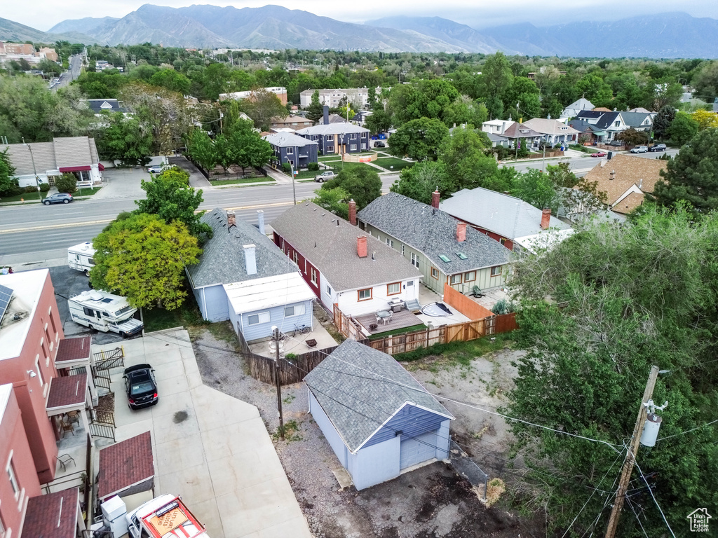 Drone / aerial view with a residential view and a mountain view