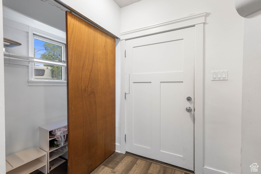 Entryway with wood finished floors