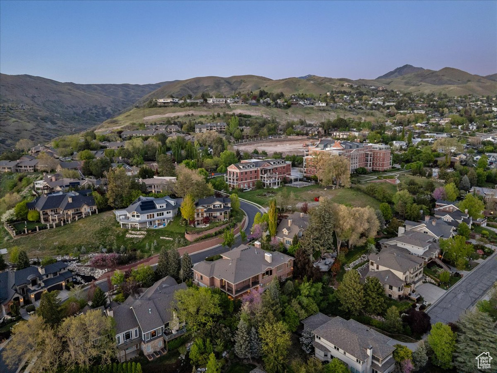 Birds eye view of property featuring a mountain view and a residential view