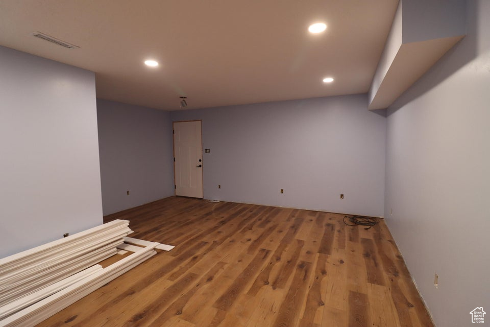 Spare room featuring visible vents, wood finished floors, and recessed lighting