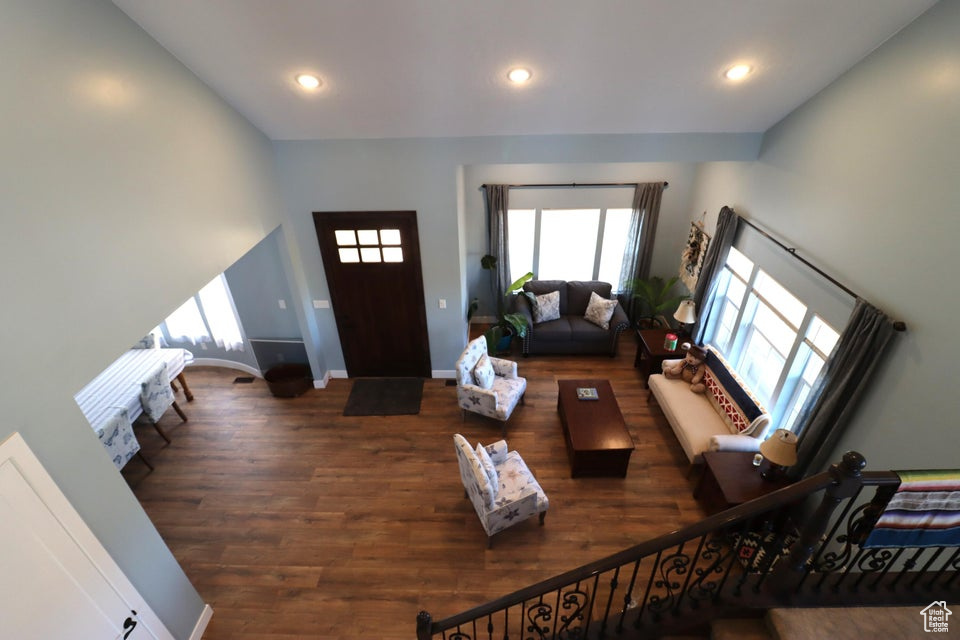Living room featuring recessed lighting, baseboards, and wood finished floors