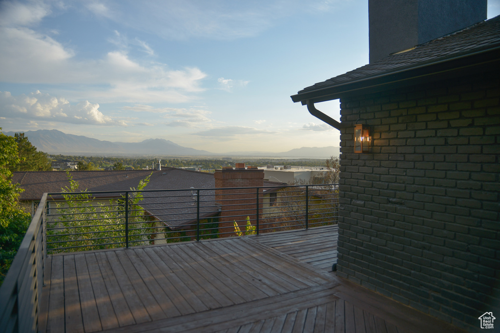 Wooden deck featuring a mountain view