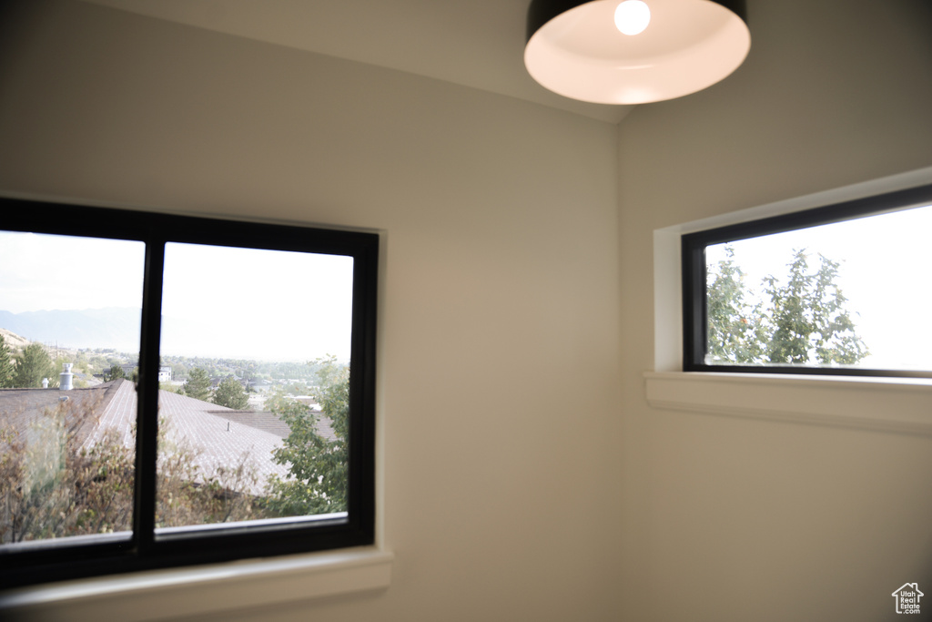 Spare room featuring a mountain view