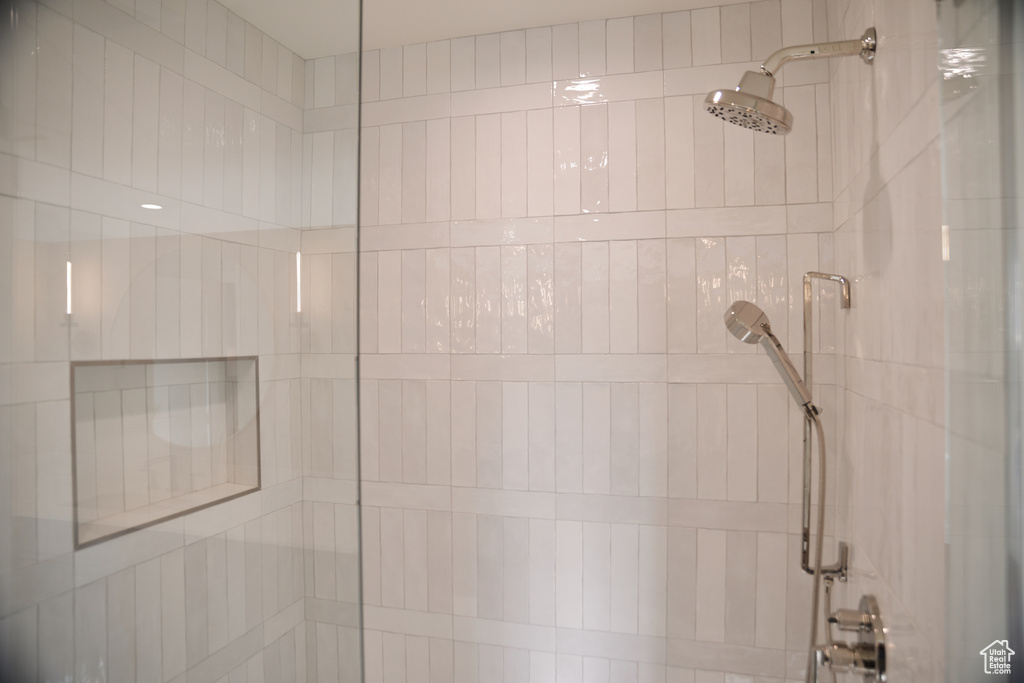 Bathroom featuring tiled shower