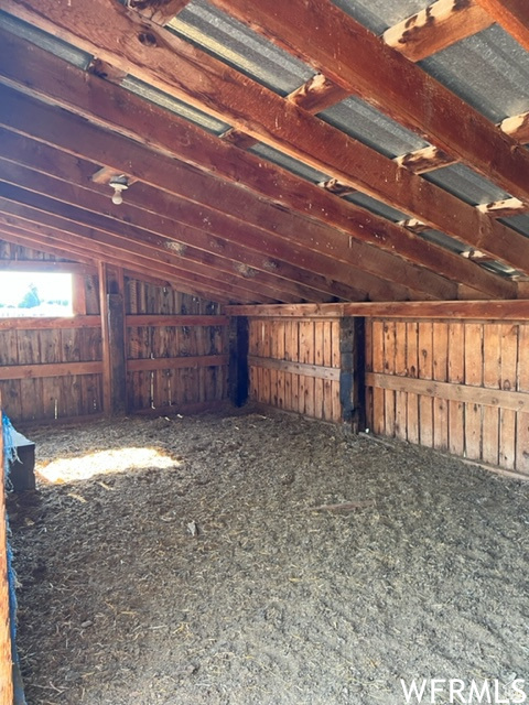 Miscellaneous room with vaulted ceiling