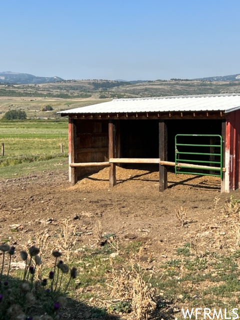 View of outbuilding featuring an outbuilding and an exterior structure