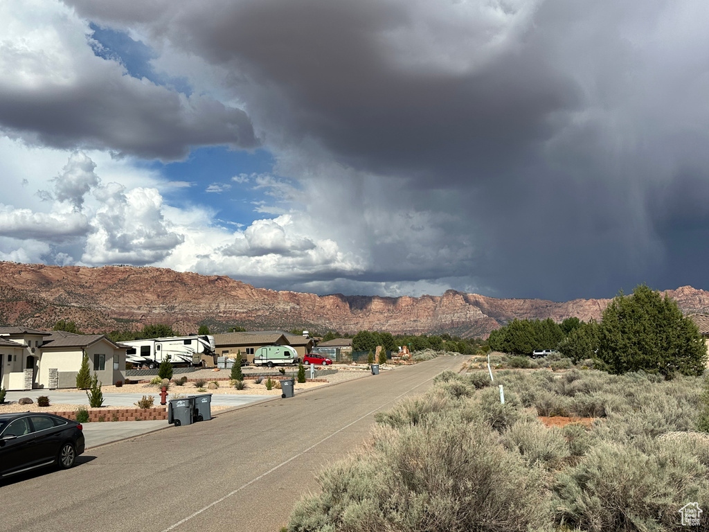 View of road featuring a residential view and a mountain view