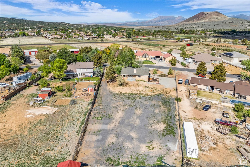 Aerial view featuring a mountain view and a residential view