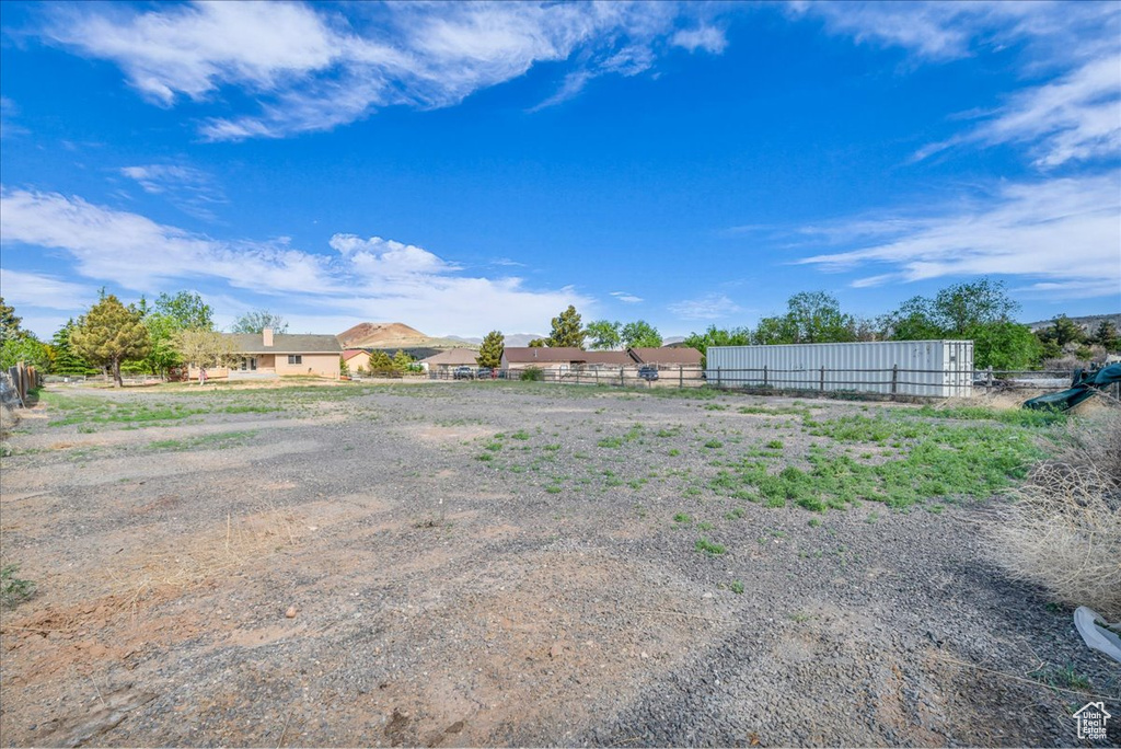 View of yard with fence