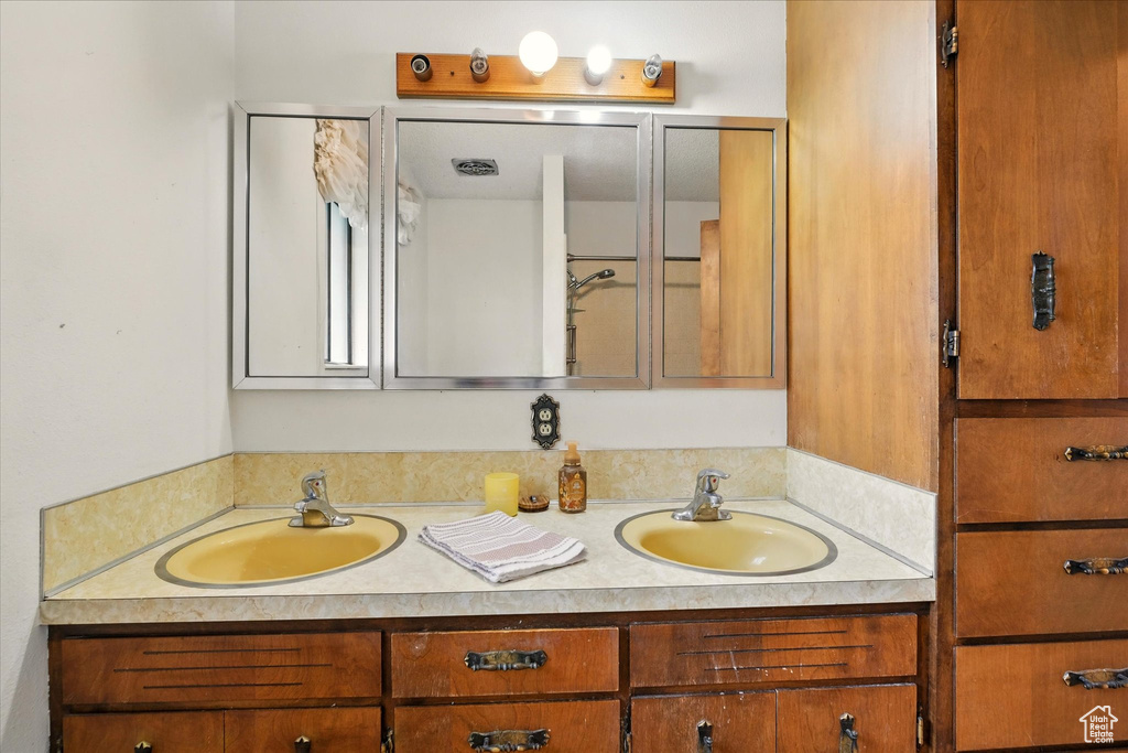 Bathroom with double vanity and a sink