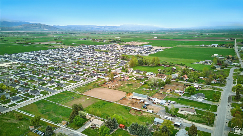 Birds eye view of property with a mountain view