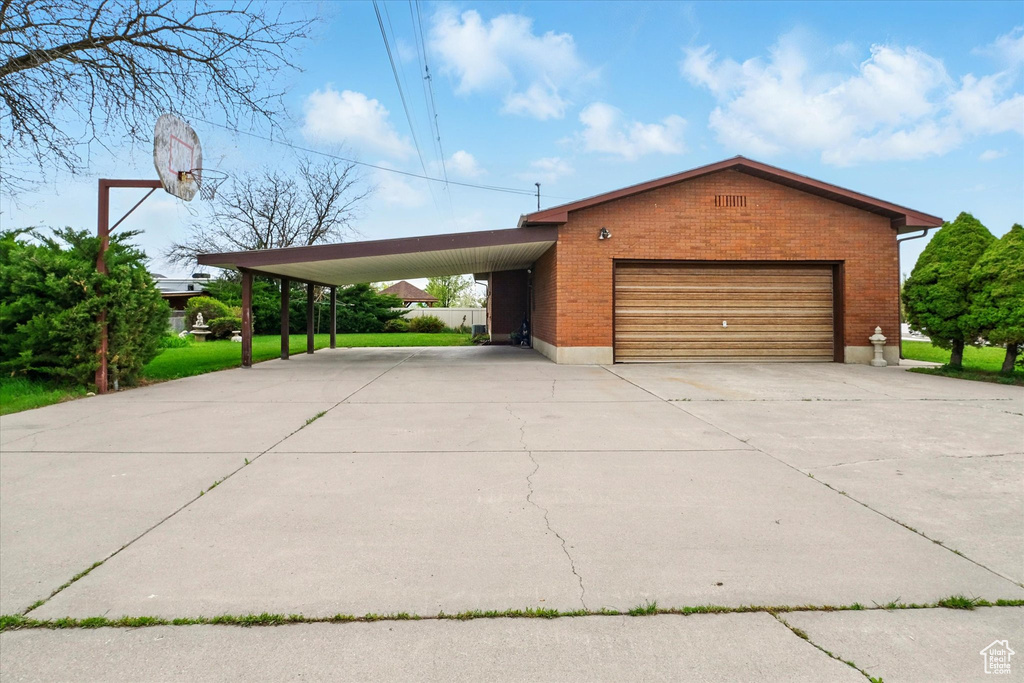 Exterior space with concrete driveway