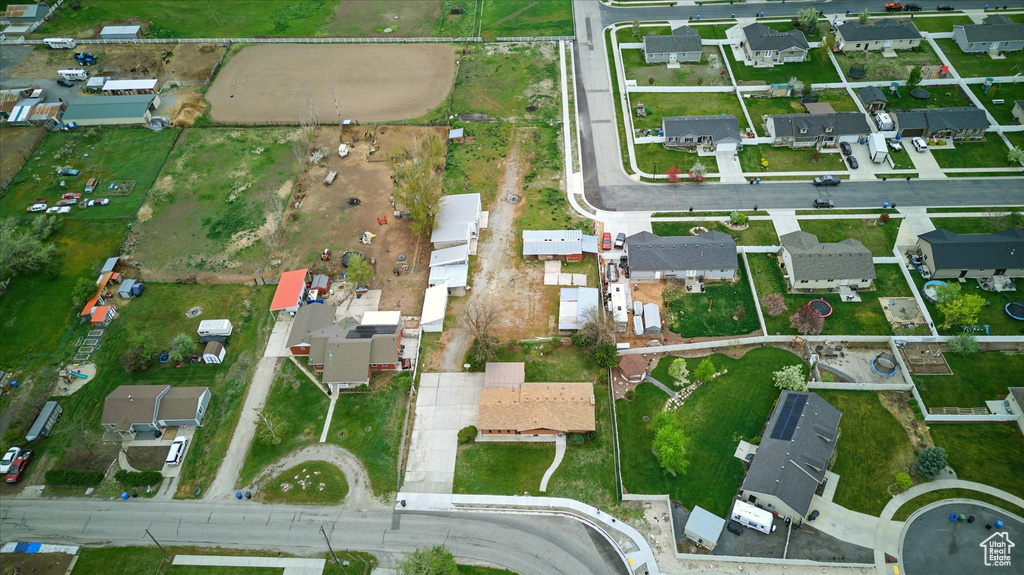 Birds eye view of property with a residential view