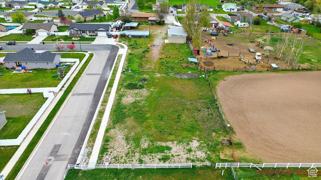 Birds eye view of property with a residential view