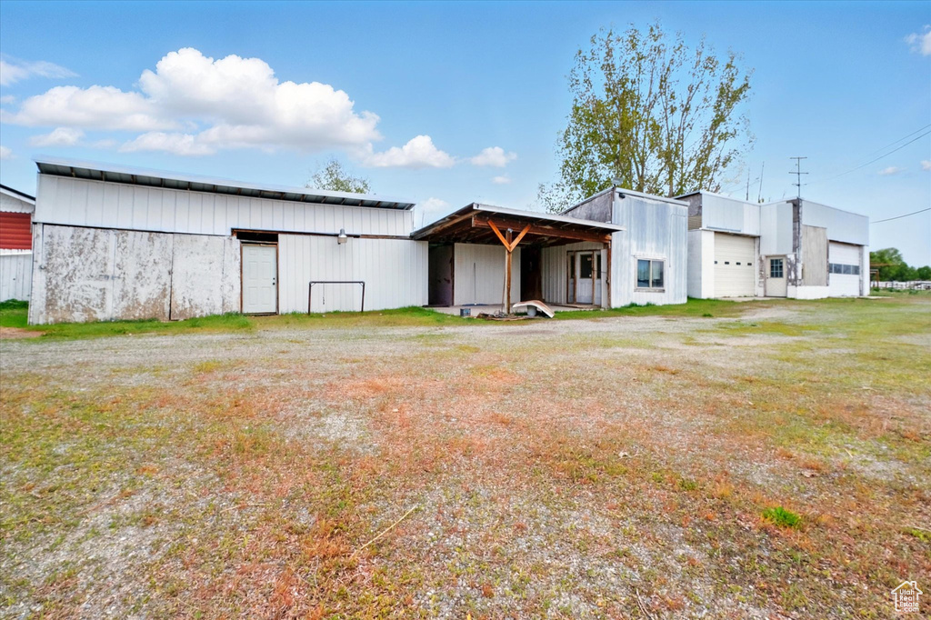 View of pole building featuring a garage