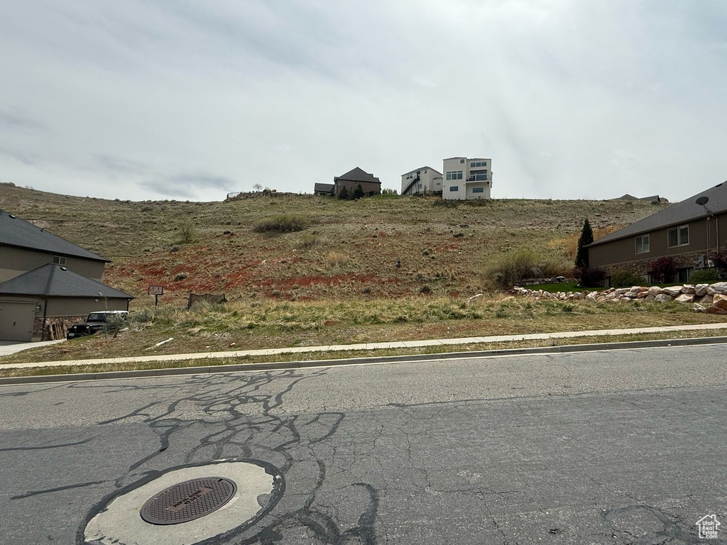 View of road with curbs and sidewalks