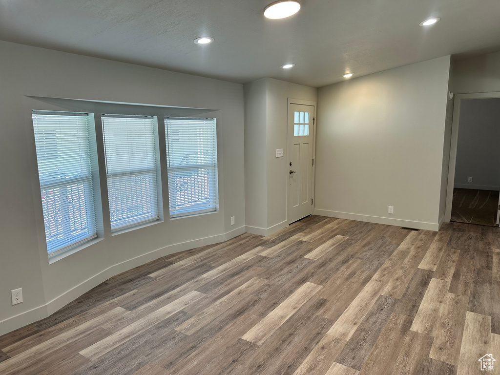 Interior space featuring plenty of natural light and wood finished floors