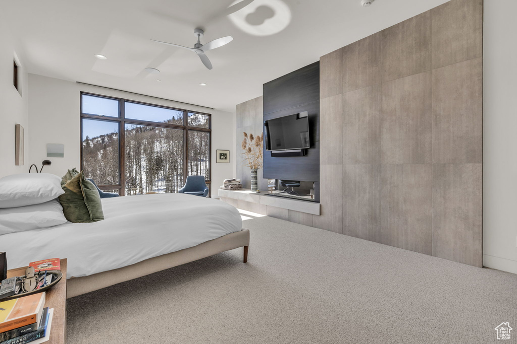 Bedroom featuring recessed lighting, carpet flooring, a ceiling fan, and access to exterior