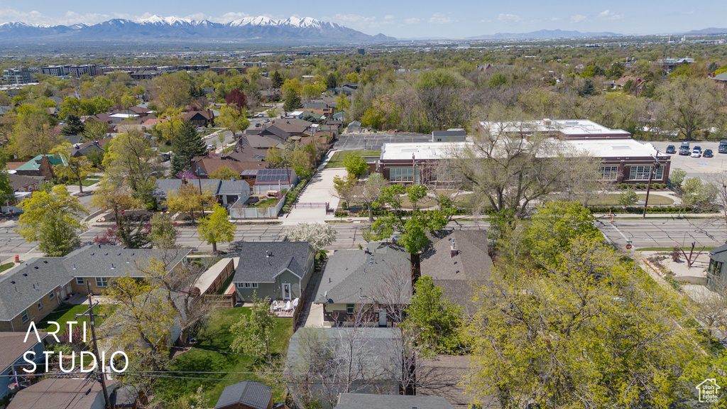 Birds eye view of property featuring a mountain view and a residential view