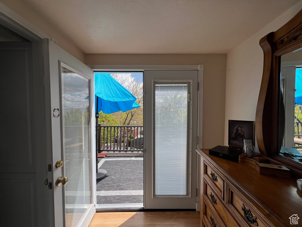 Doorway to outside featuring plenty of natural light