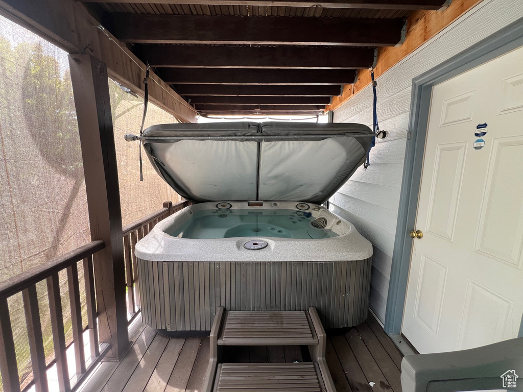 Exterior space featuring a hot tub