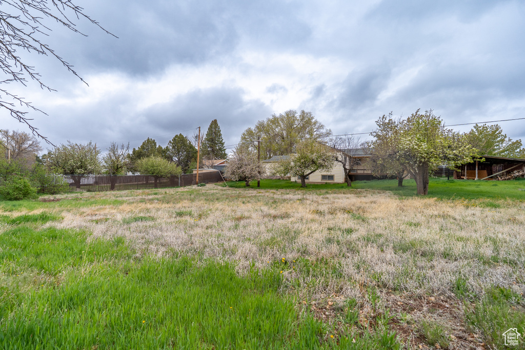View of yard with fence