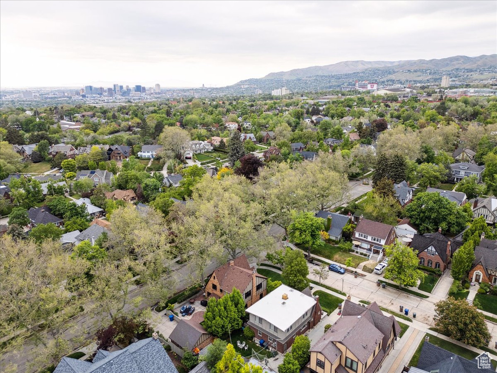 Birds eye view of property with a residential view and a mountain view