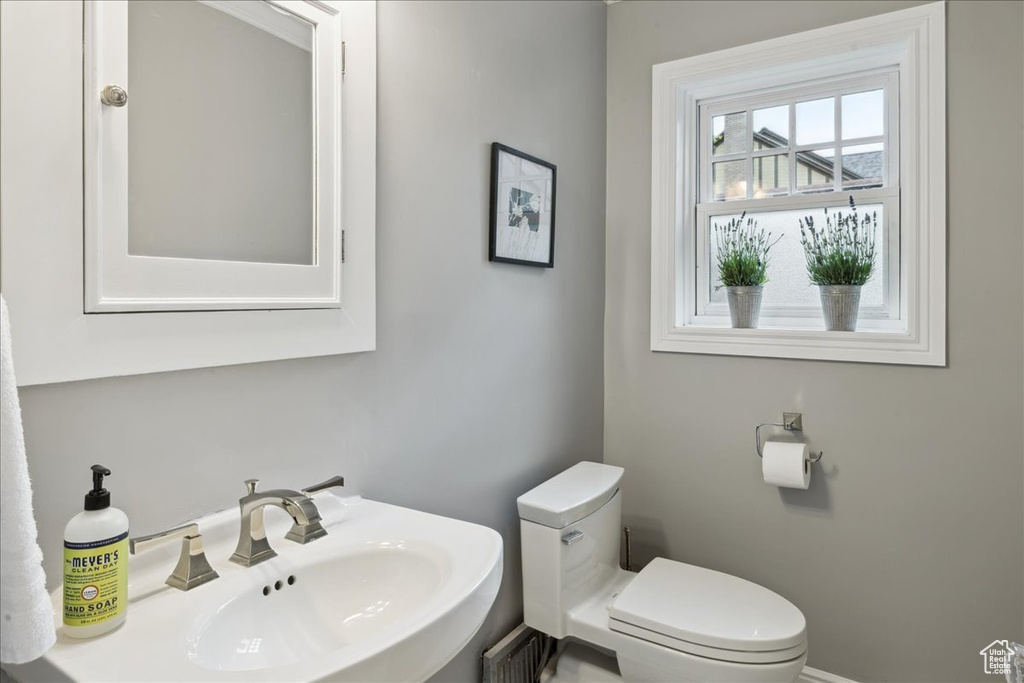 Bathroom with a sink and toilet
