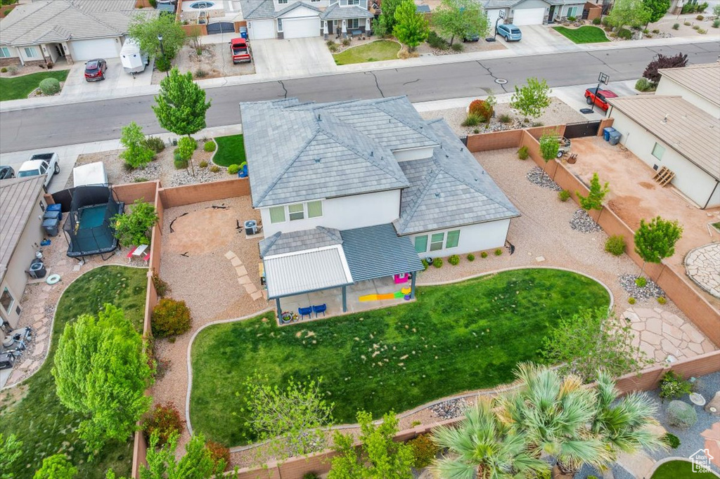 Birds eye view of property with a residential view