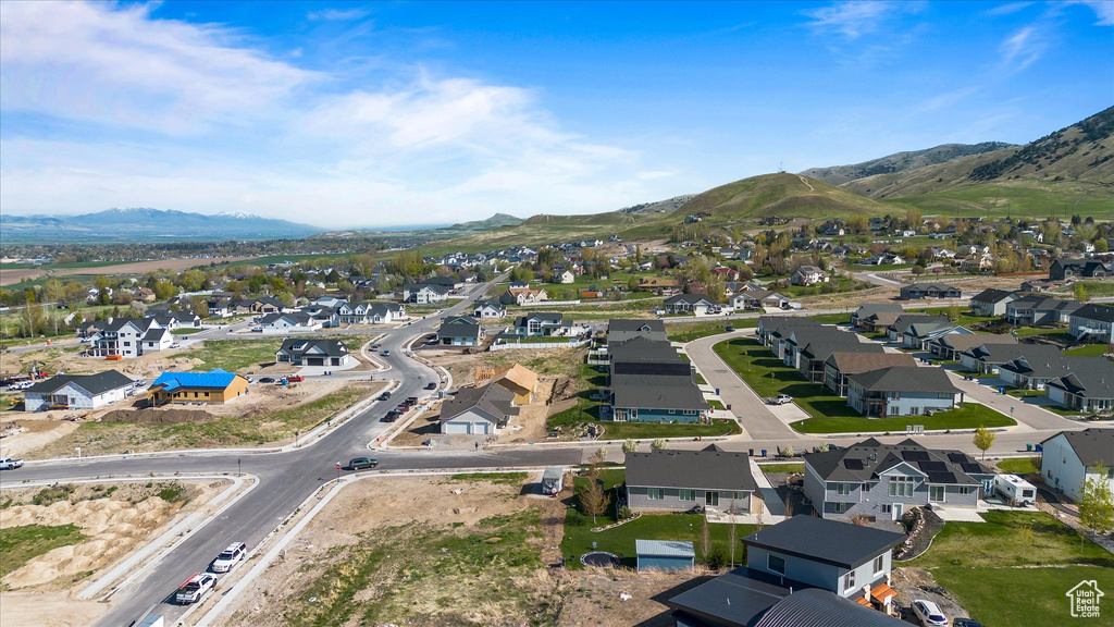 Aerial view featuring a mountain view and a residential view