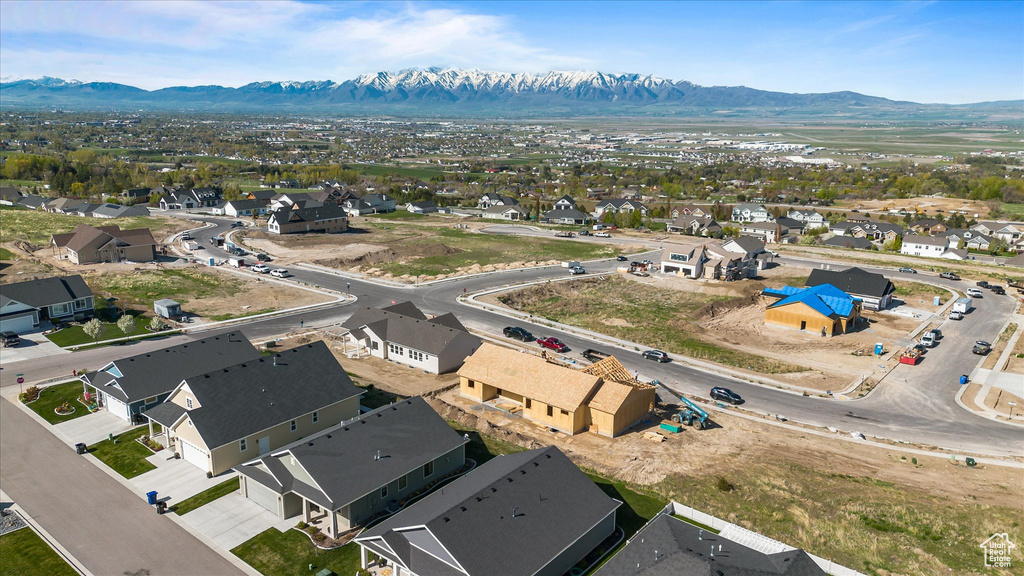 Drone / aerial view with a mountain view and a residential view
