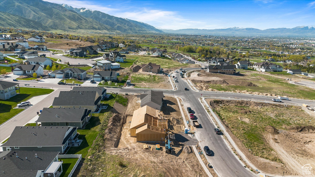 Birds eye view of property featuring a mountain view and a residential view