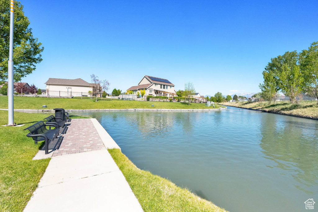 Property view of water with fence