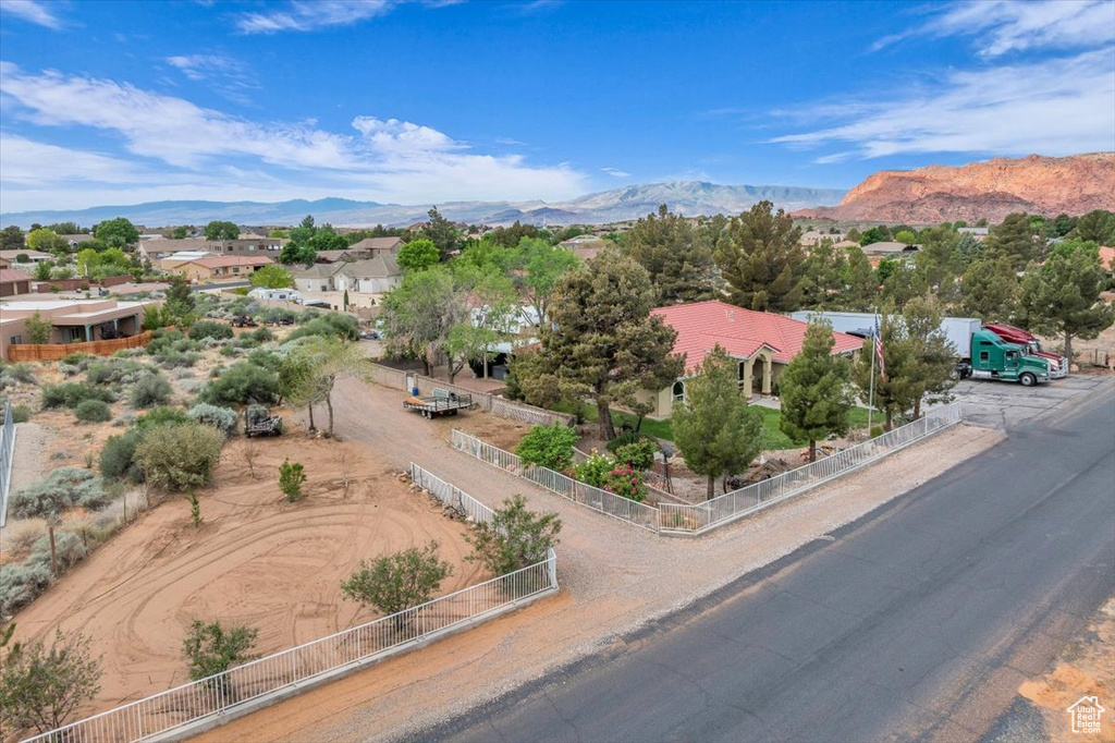 Aerial view featuring a mountain view and a residential view