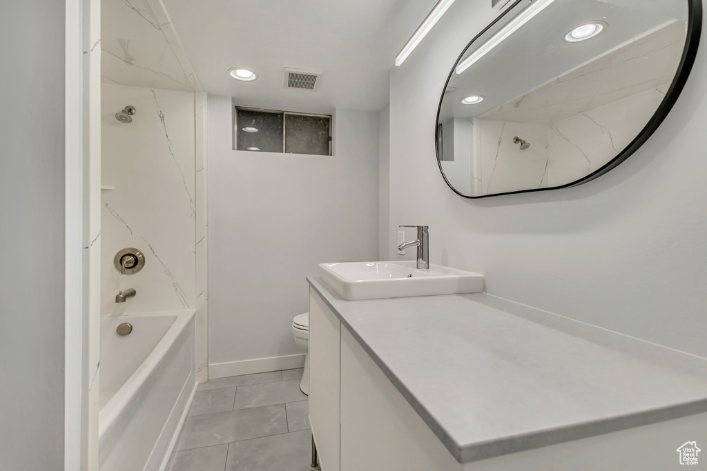 Bathroom with recessed lighting, toilet,  shower combination, visible vents, and vanity