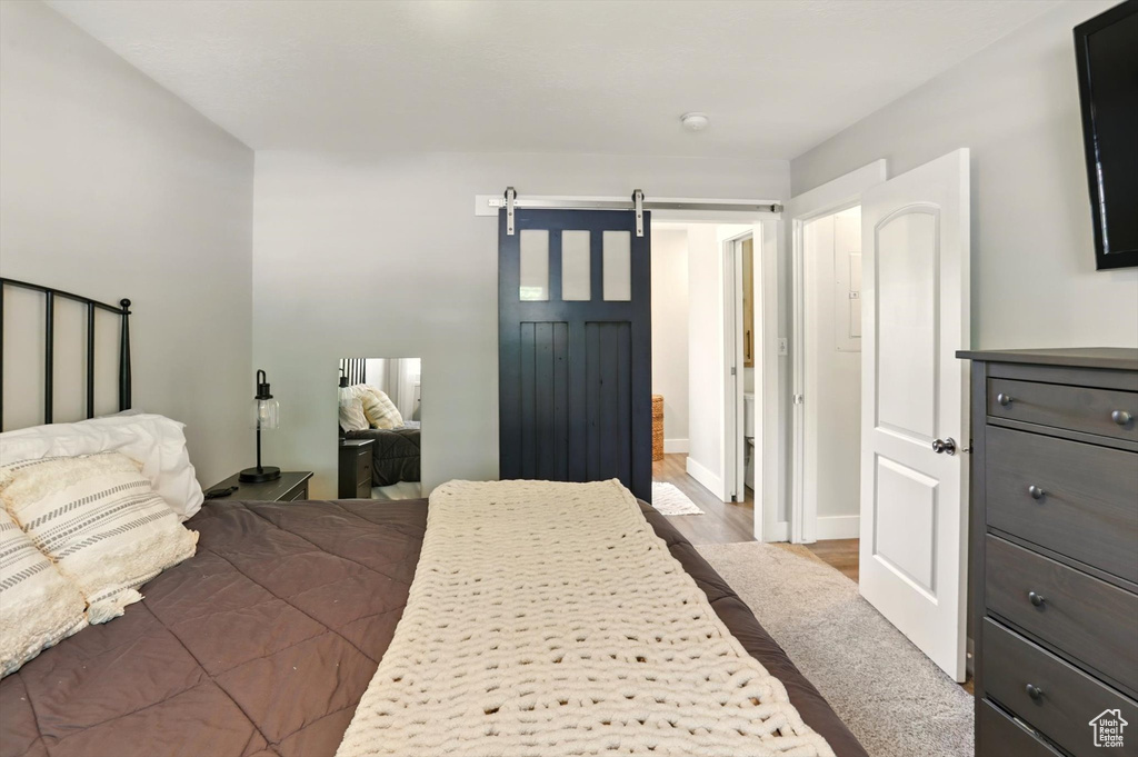 Bedroom with a barn door