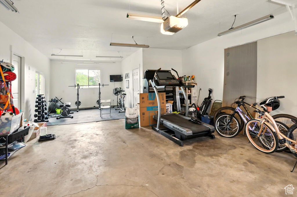 Garage featuring a garage door opener