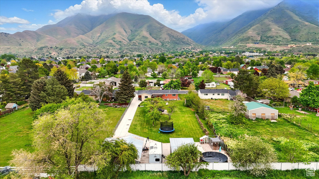 Drone / aerial view with a mountain view and a residential view