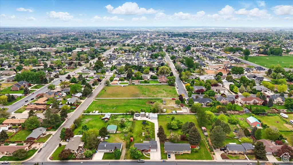 Birds eye view of property with a residential view