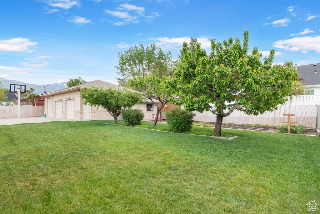 View of yard with fence
