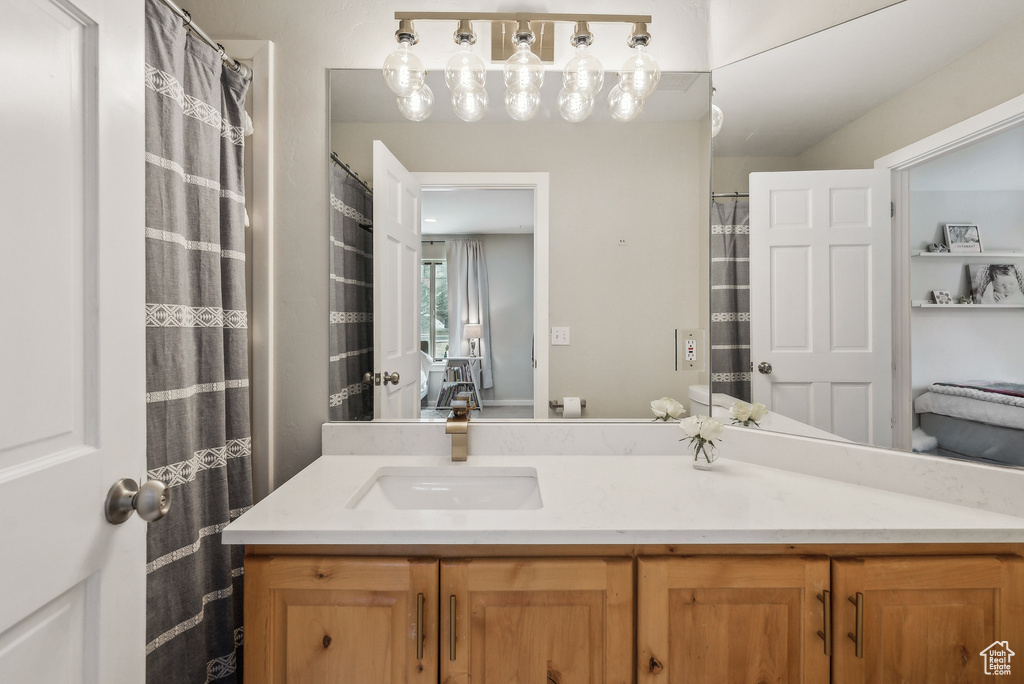 Bathroom with ensuite bath and vanity
