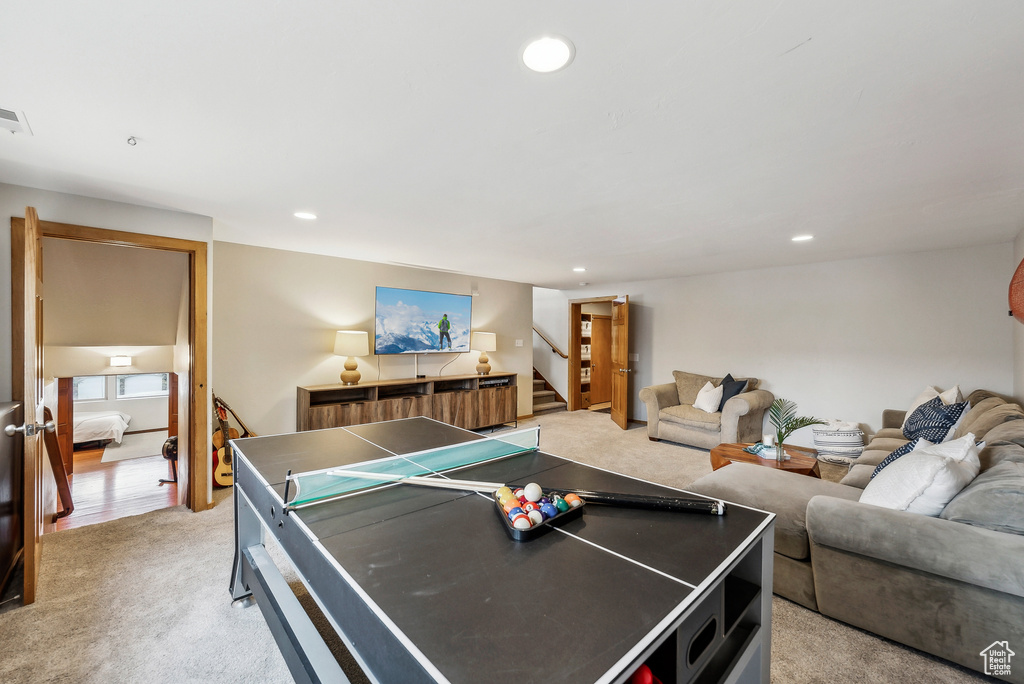 Playroom with light carpet, visible vents, and recessed lighting