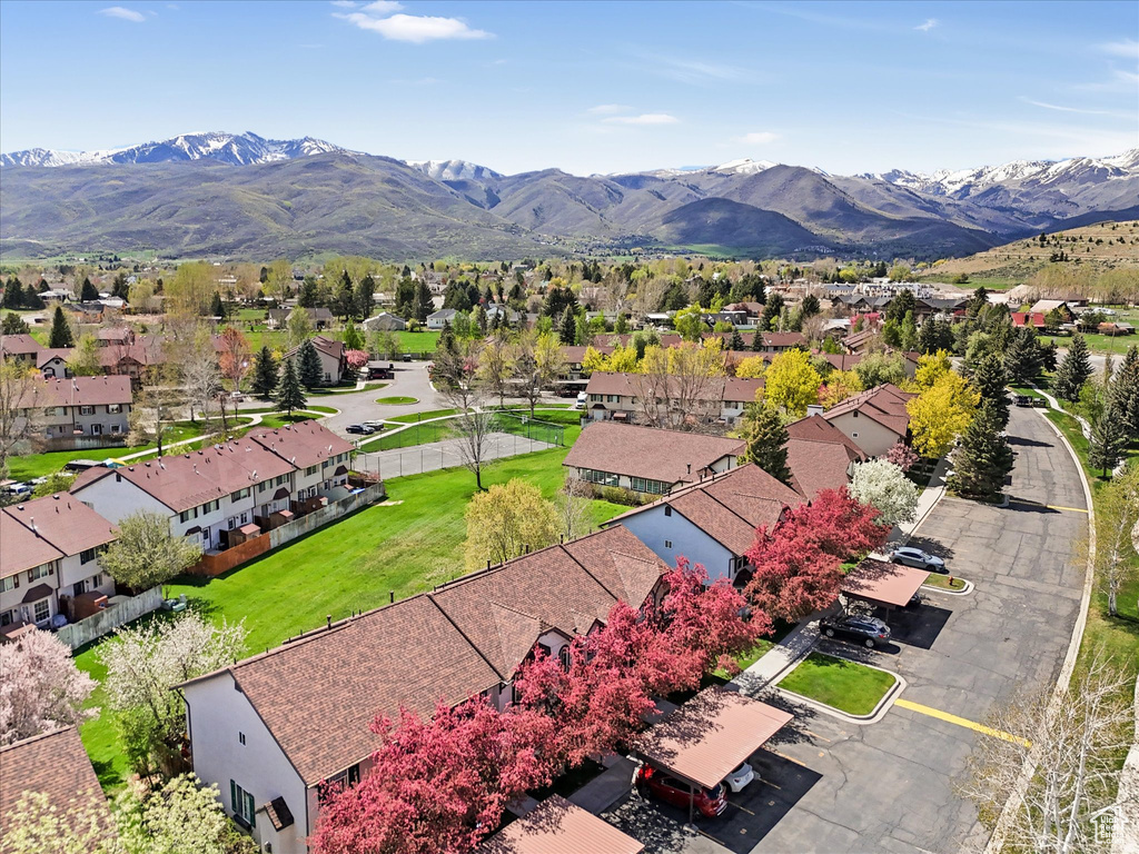 Drone / aerial view with a mountain view and a residential view