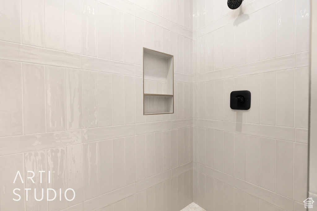 Bathroom with tiled shower